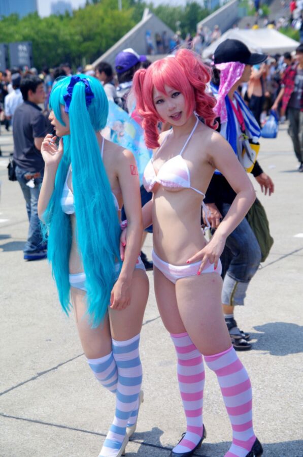 Free porn pics of Two Very Sexy and Cute Asian Cosplay Girls on The Street! 2 of 3 pics