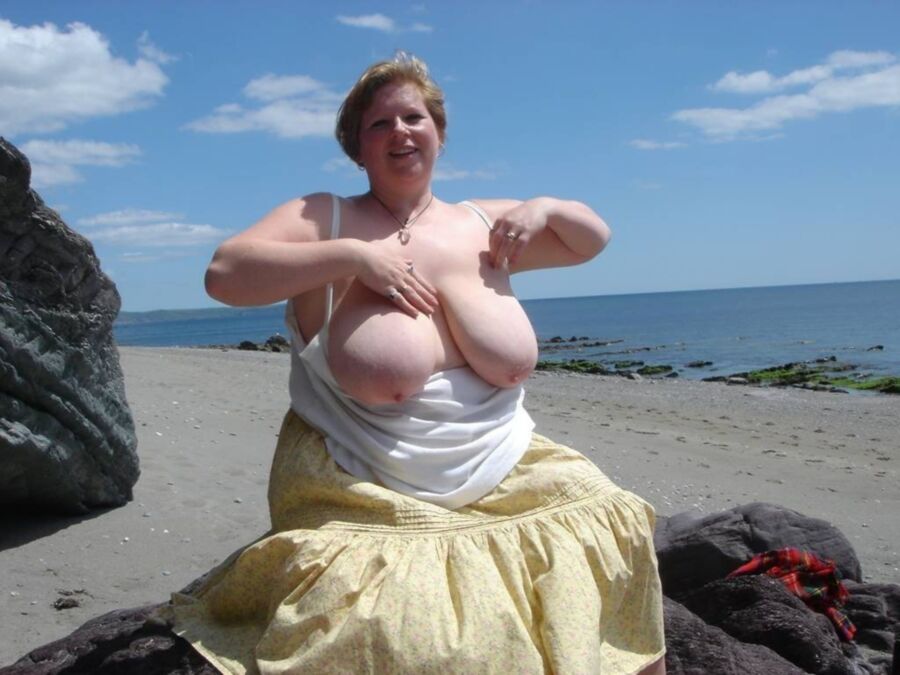 Free porn pics of Big boobs on the beach 3 of 53 pics