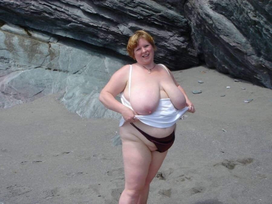 Free porn pics of Big boobs on the beach 18 of 53 pics