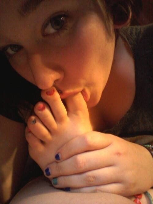 Free porn pics of girls loving their toes 23 of 83 pics
