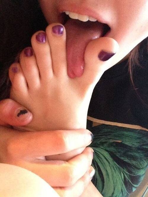 Free porn pics of girls loving their toes 12 of 83 pics