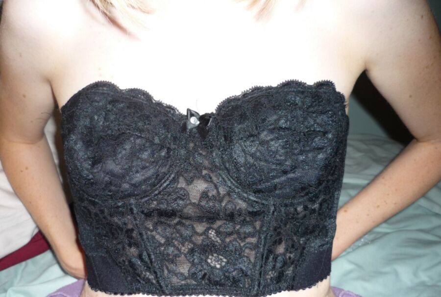Free porn pics of Miss Slut Pulling her tits out again in a Black Corset 2 of 12 pics