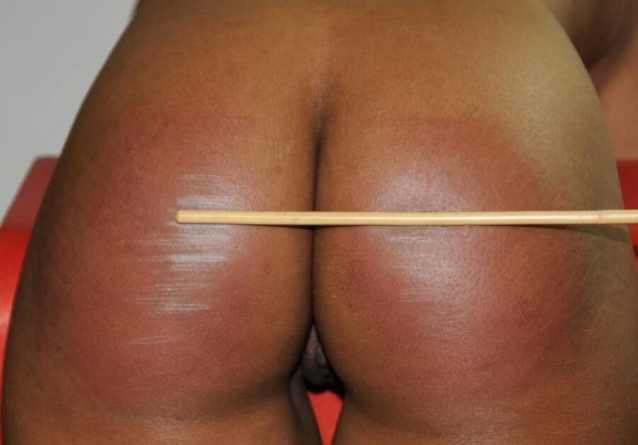 Free porn pics of Another Caned Nigger - From Spanking Sarah 2 of 4 pics